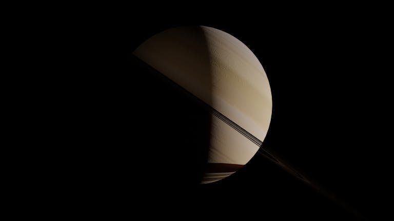 Beautiful view of Saturn with its rings set against a dark space background.